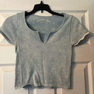 Light blue with speckled white Aeropostale crop top, women’s medium, tight fit.